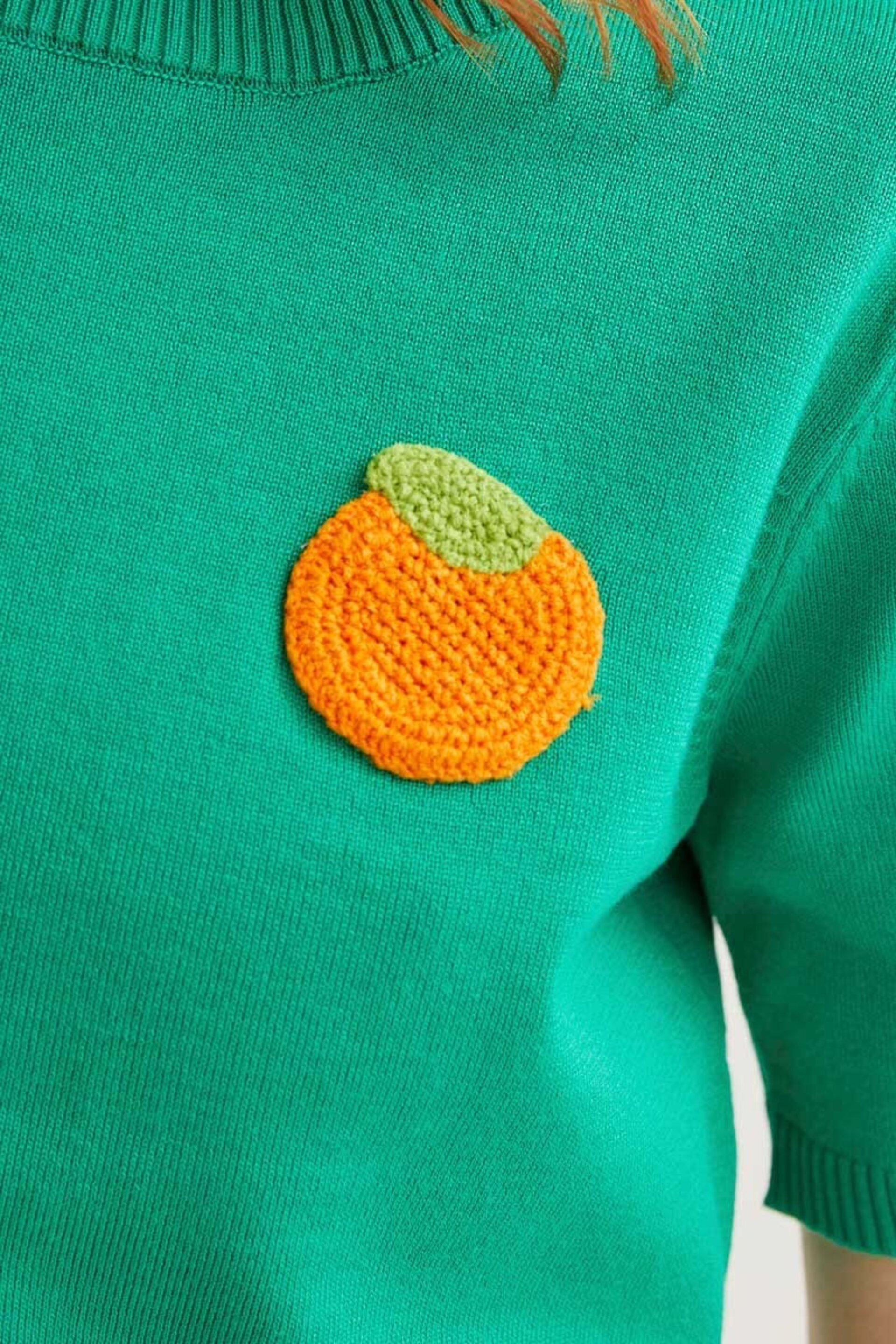 Top de punto verde con bordado de naranja compañía fantástica - 2